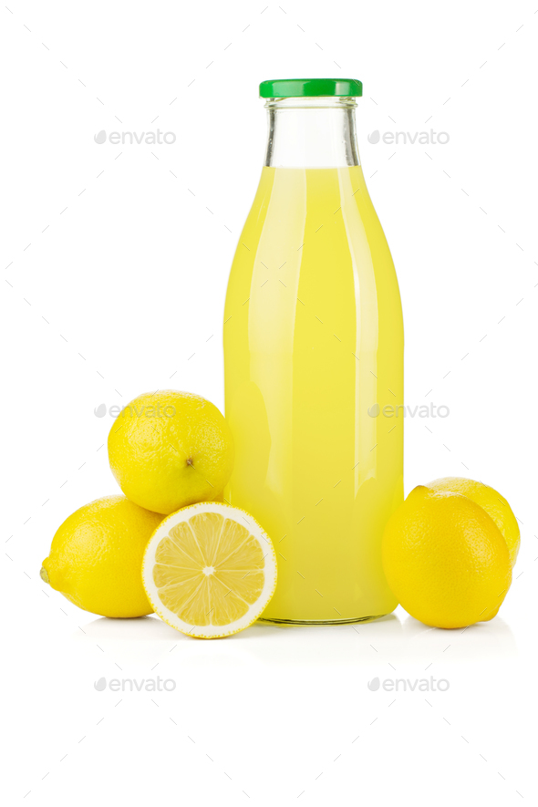 Bottle of lemon juice and fresh lemons Stock Photo by karandaev PhotoDune
