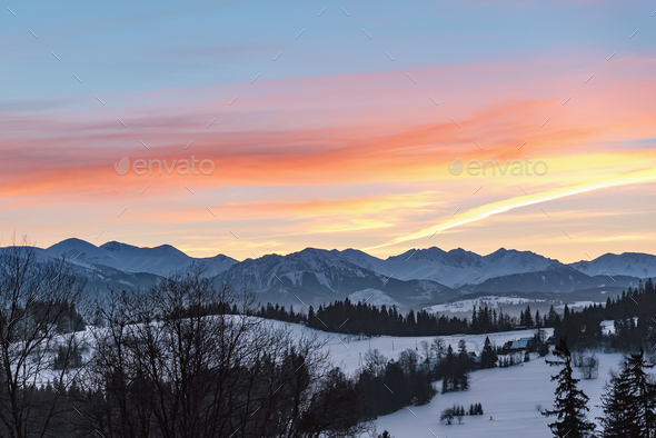 Winter landscape of High Tatra Mountains at dusk Stock Photo by mkos83