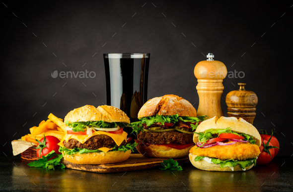 Different Burgers with Cola Fast Food - Stock Photo - Images
