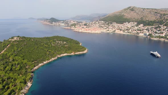 Aerial view of the Lokrum Island, Dubrovnik in the background, Croatia alt