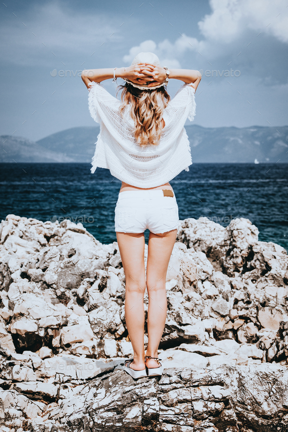 Beauty woman at the seaside - Stock Photo - Images