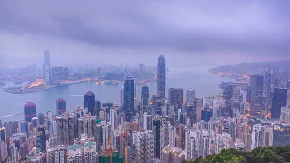 The Famous View of Hong Kong From Victoria Peak Night To Day Timelapse alt
