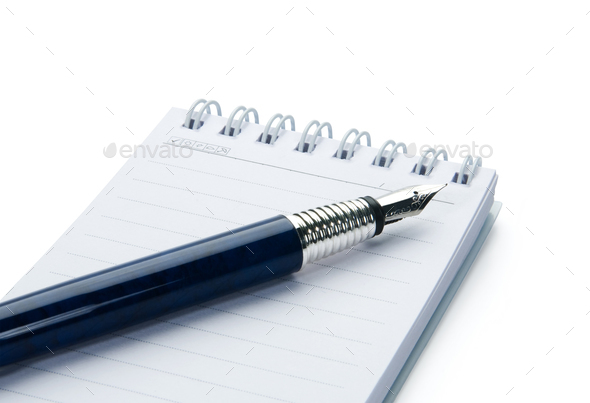 Pen on notebook, isolated on white background. - Stock Photo - Images