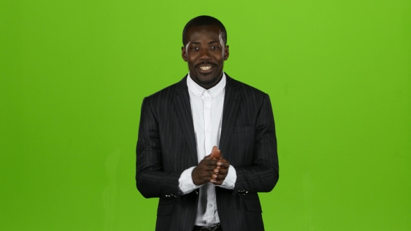 Black African American Guy Claps His Hands and Smiles. Green Screen alt