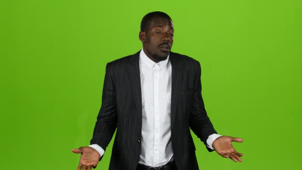 African American Is Indignant, He Is Angry and Aggressive. Green Screen. alt