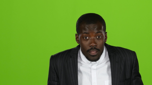 African American Is Indignant, He Is Angry and Aggressive. Green Screen alt