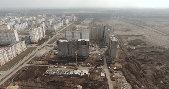 New Skyscrapers and Streets a Modern Congested Urban City Development in Autumn Time. Aerial View alt