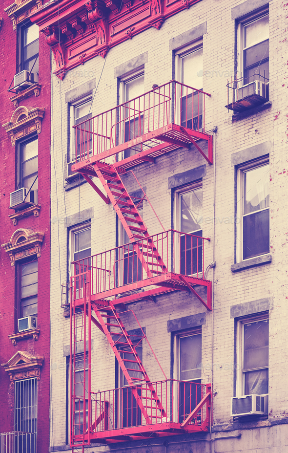Residential building fire escape in Manhattan, New York, USA. Stock Photo by Maciejbledowski
