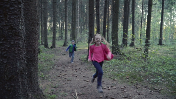 Children Running in Forest