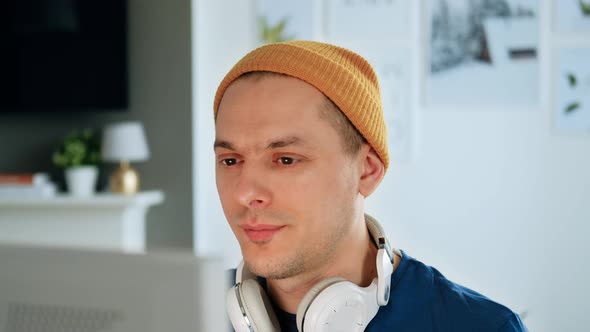 Young man studying online of working from home in internet.