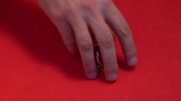 Croupier Makes Trick with Chips.