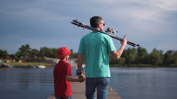 Cheerful Kid with Father Posing alt