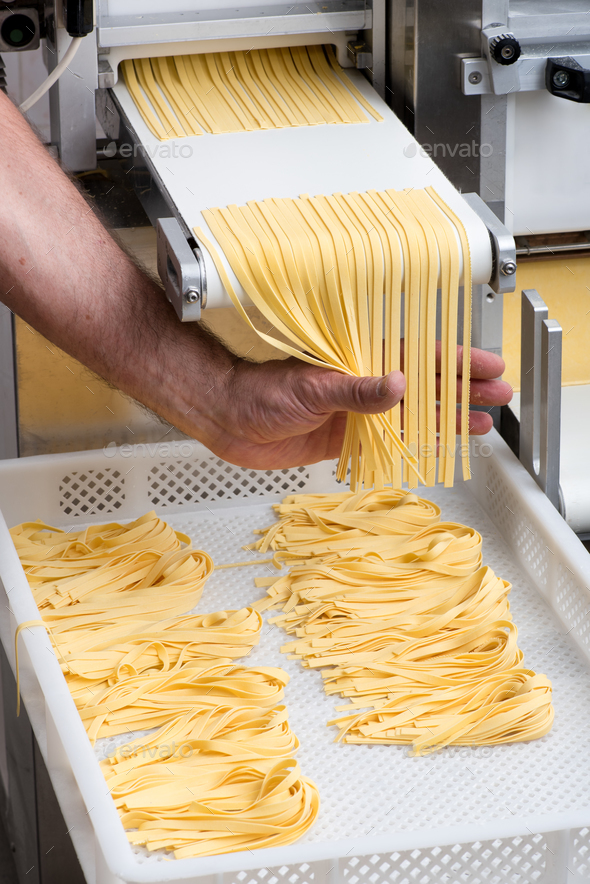 Chef making fresh tagliatelle pasta Stock Photo by Photology75 | PhotoDune
