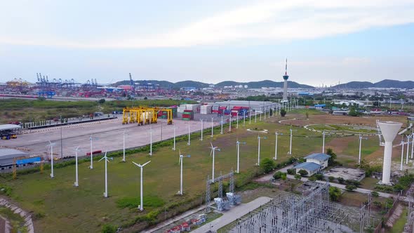 Aerial view of wind turbines and container cargo in Laem Chabang, Chon Buri, Thailand. alt