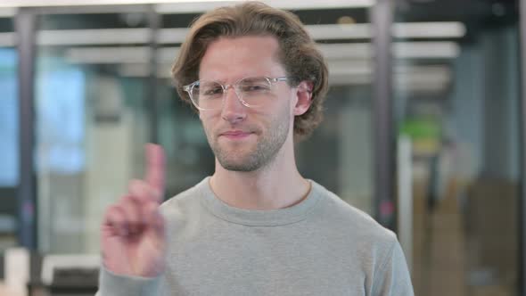 Portrait of No Sign By Young Businessman By Finger alt