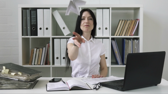 Business Woman Making a Paper Airplane alt