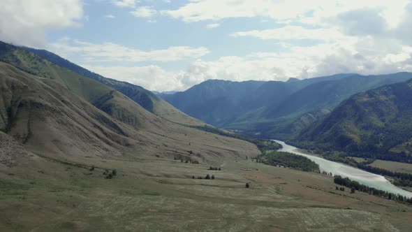Aerial view from on valley and mountains of Ak-Kem with river Katun in Altai
