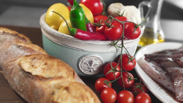 VideoHive Bread with Raw Calamari and Fresh Vegetables on the Kitchen Table Fish and Vegetables Cooking By 20204344 VideoHive Bread with Raw Calamari and Fresh Vegetables on the Kitchen Table Fish and Vegetables Cooking By 20204344