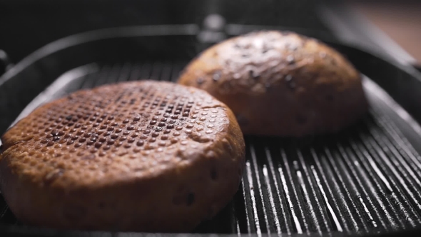 VideoHive Roasting Crispy Buns for Burgers Making Hamburger Fast Food Cooking at Home Buns Is Grilled 20204946 VideoHive Roasting Crispy Buns for Burgers Making Hamburger Fast Food Cooking at Home Buns Is Grilled 20204946