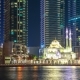 White Mosque Among Skyscrapers in the Harbor Area of Dubai Marina - VideoHive Item for Sale