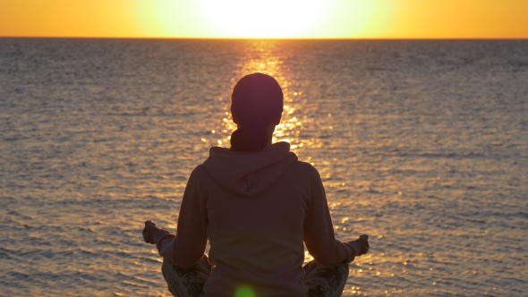 Inspiration. Yoga on Sunrise on the Beach