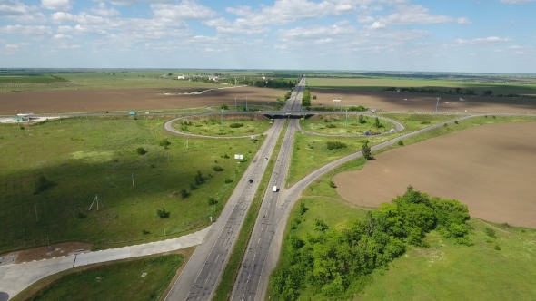 Aerial Shot of a Country Highway in Kherson Region in a Sunny Day in Summer