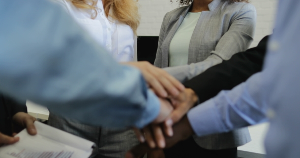 Group Of Business People Join Hands Together In Creative Modern Office, Successful Businesspeople
