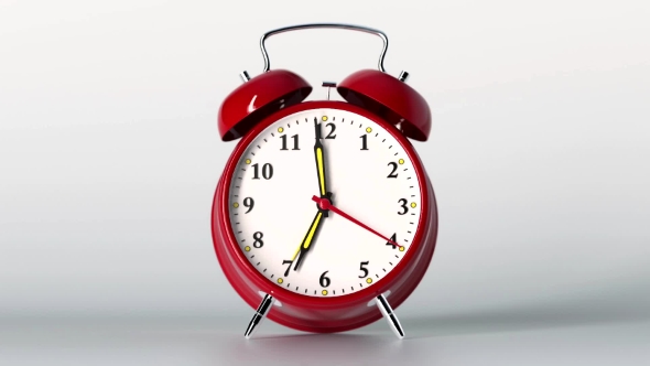 Vintage Red Alarm Clock on White Background. Time Concept.