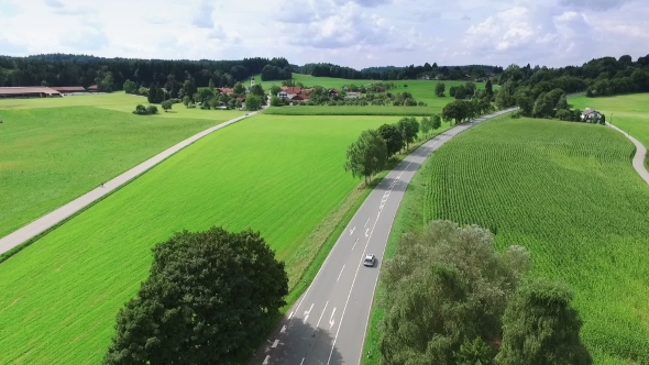 Aerial View. Cars Driving on Country Road