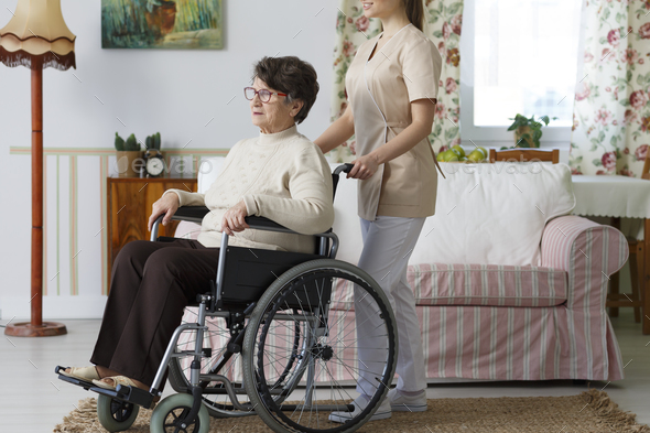 Senior in a wheelchair - Stock Photo - Images