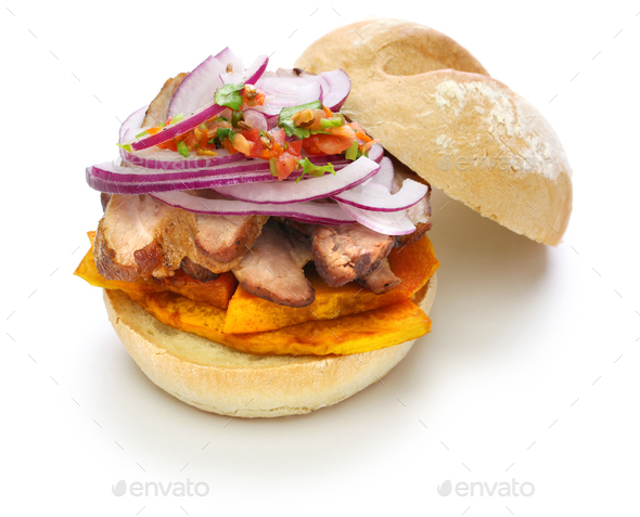 pan con chicharron, peruvian pork sandwich Stock Photo by motghnit