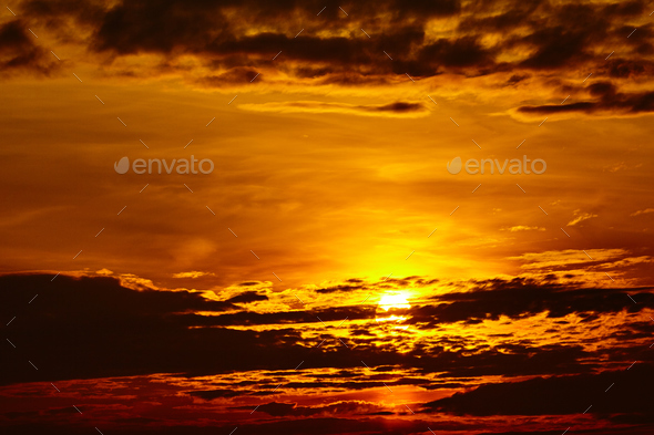sunset sky background. Fiery orange sunset Stock Photo by EwaStudio