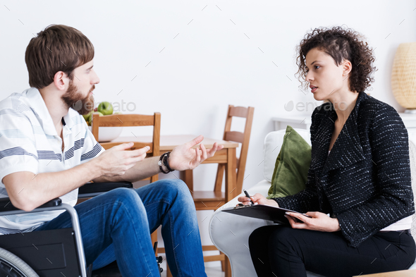 Man talking to psychologist