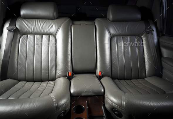 back seats of modern luxury car interior, black leather Stock Photo by  gargantiopa