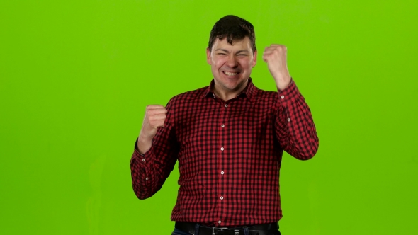 Guy Is Happy with His Victories, He Is Happy. Green Screen alt