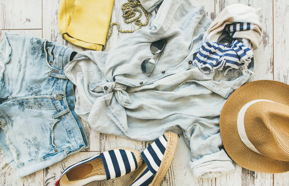 Pastel coloured summer women's clothes, parquet background - Stock Photo - Images