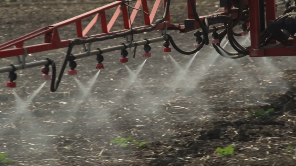 Spraying Fields with Herbicides by 3D Nozzle Sprayer alt