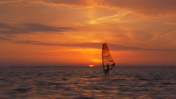 Windsurfing at Breathtaking View of Sunset