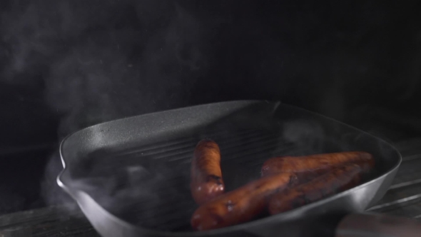 VideoHive Sausages Is Roasting with Smoke on the Hot Grilling Pan Cooking Food Meat Meals Tasty Food Chef 20256239 VideoHive Sausages Is Roasting with Smoke on the Hot Grilling Pan Cooking Food Meat Meals Tasty Food Chef 20256239