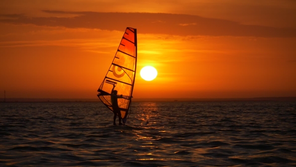 Windsurfing Near Big Sun at Sunrise