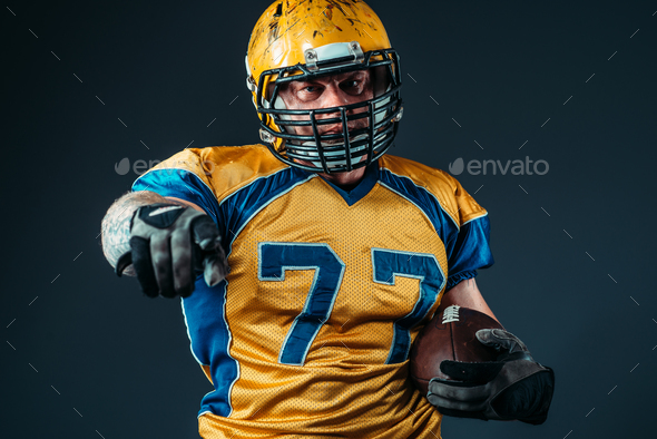 American football player pointing his finger - Stock Photo - Images