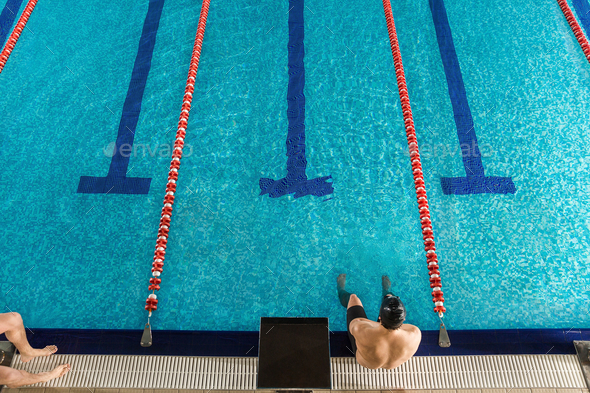 Top view of a male swimmer sitting