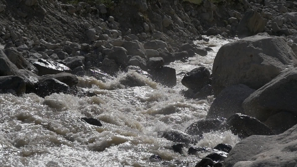 Stream of Water in River in