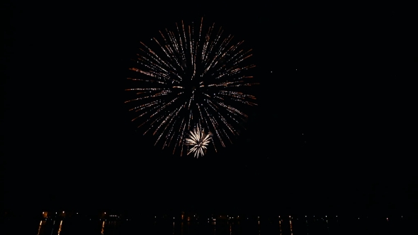 Flashes of Fireworks in the Night Sky alt