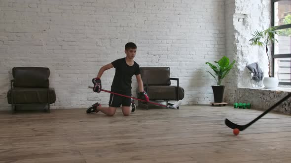 Indoor Hockey Training for Son and Mom. Slow Motion. alt