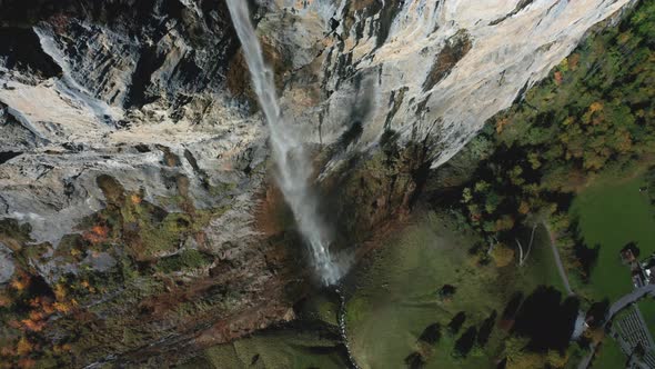Aerial View of a Waterfall and Rainbow in the Village of Lauterbrunnen, Switzerland in the Fall