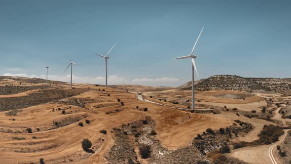 Wind Turbines Blades Generate Produce Alternative Green Energy Electricity in Desert Area