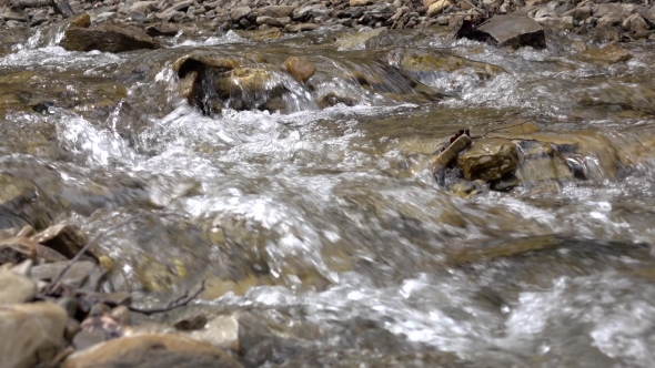 Mountain Calm Stream Among Stone Banks with Clear Spring Water alt