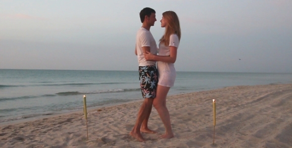 Couple Dancing On the Beach