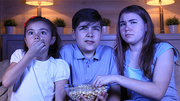 Children Watching Scary Movie On TV
